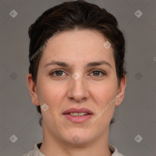 Joyful white adult female with short  brown hair and brown eyes