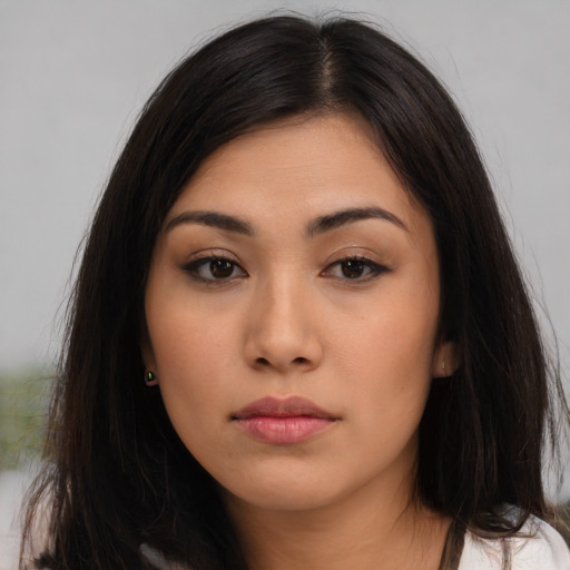 Neutral asian young-adult female with long  brown hair and brown eyes