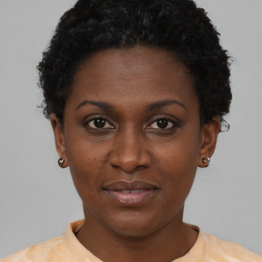 Neutral black young-adult female with short  brown hair and brown eyes
