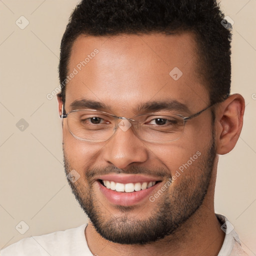 Joyful white young-adult male with short  brown hair and brown eyes