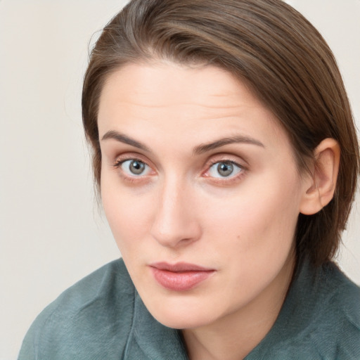 Neutral white young-adult female with medium  brown hair and blue eyes