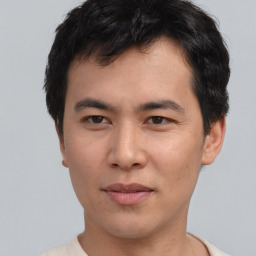 Neutral asian young-adult male with short  brown hair and brown eyes