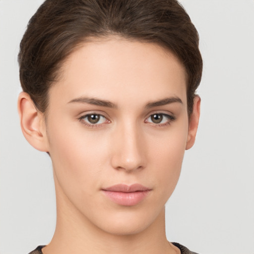 Neutral white young-adult female with short  brown hair and brown eyes