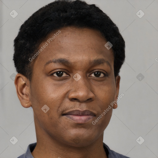 Joyful black young-adult male with short  brown hair and brown eyes