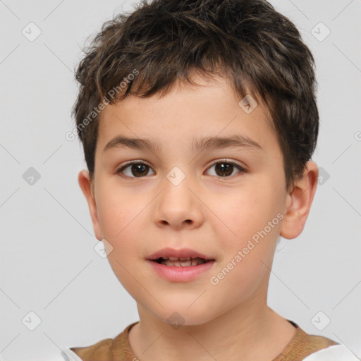 Joyful white child male with short  brown hair and brown eyes