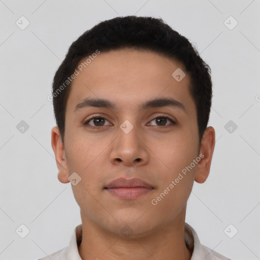 Neutral latino young-adult male with short  brown hair and brown eyes