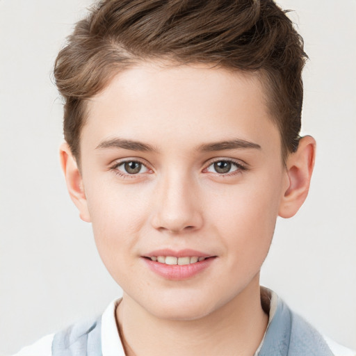 Joyful white child male with short  brown hair and brown eyes