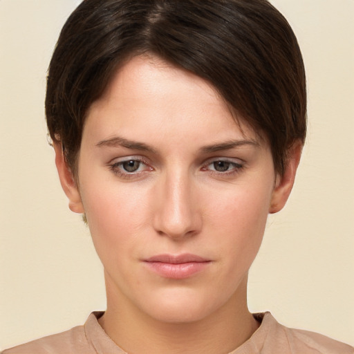 Neutral white young-adult female with short  brown hair and brown eyes