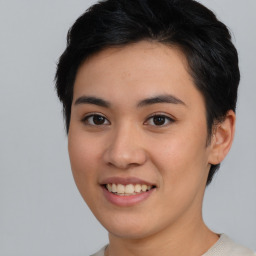 Joyful asian young-adult female with short  brown hair and brown eyes