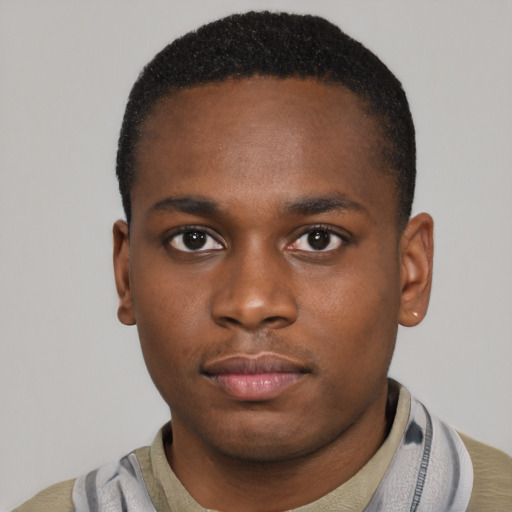 Neutral black young-adult male with short  black hair and brown eyes