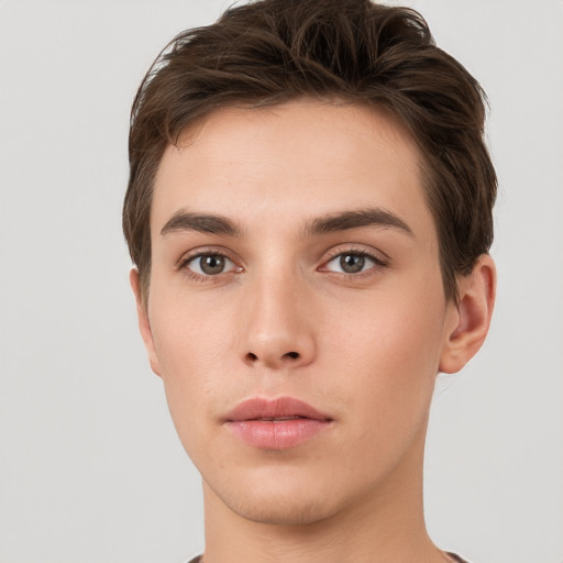 Neutral white young-adult male with short  brown hair and brown eyes