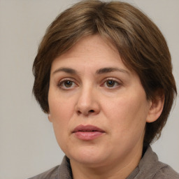 Neutral white adult female with medium  brown hair and brown eyes