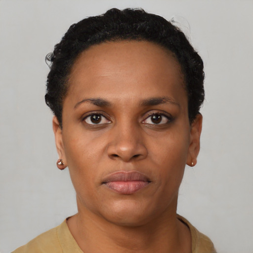 Neutral black young-adult female with short  black hair and brown eyes