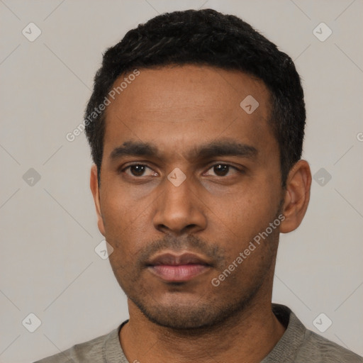 Neutral latino young-adult male with short  black hair and brown eyes