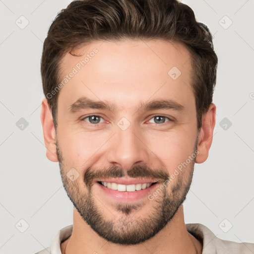 Joyful white young-adult male with short  brown hair and brown eyes