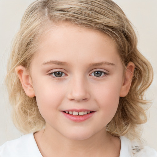 Joyful white child female with medium  brown hair and grey eyes