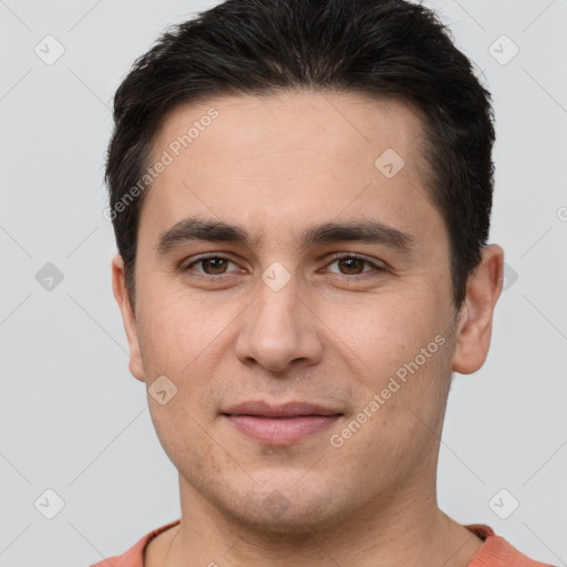 Joyful white young-adult male with short  brown hair and brown eyes