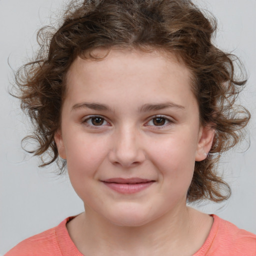 Joyful white child female with medium  brown hair and brown eyes