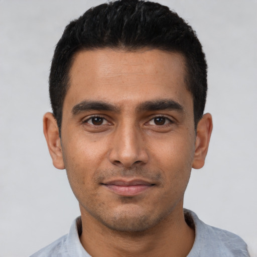 Neutral latino young-adult male with short  black hair and brown eyes