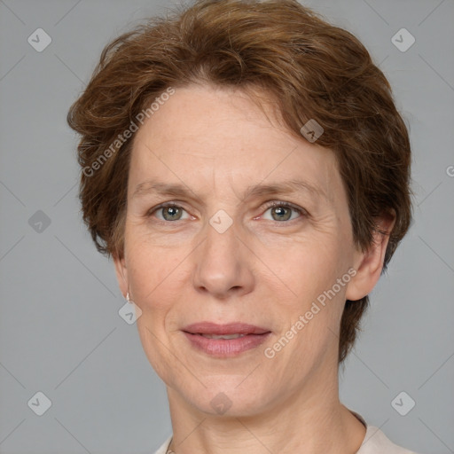 Joyful white adult female with short  brown hair and grey eyes