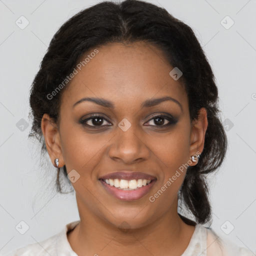 Joyful black young-adult female with medium  brown hair and brown eyes