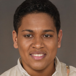 Joyful latino young-adult male with short  brown hair and brown eyes