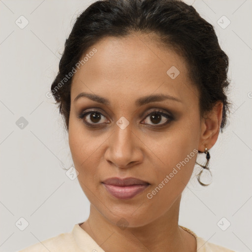 Joyful latino young-adult female with short  brown hair and brown eyes