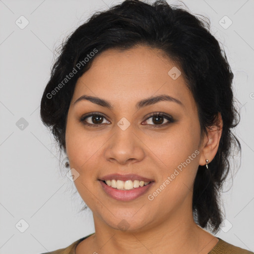 Joyful latino young-adult female with medium  brown hair and brown eyes