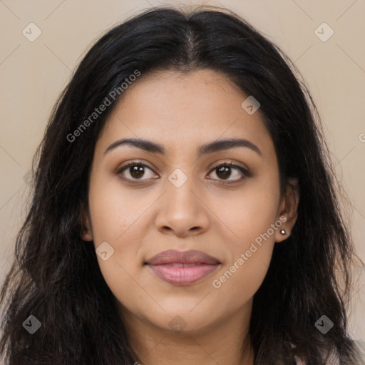 Joyful latino young-adult female with long  brown hair and brown eyes