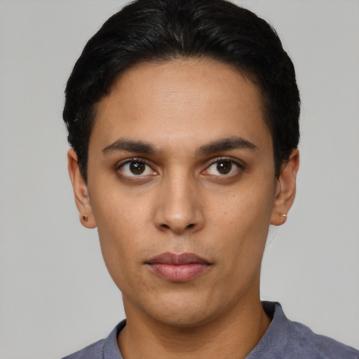 Neutral latino young-adult male with short  black hair and brown eyes