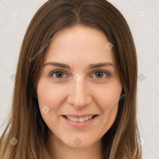 Joyful white young-adult female with long  brown hair and brown eyes