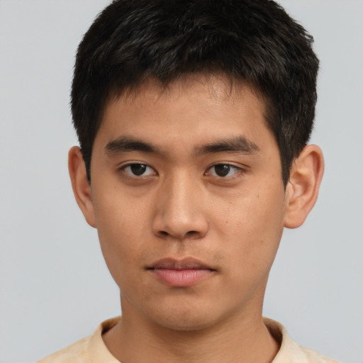 Neutral asian young-adult male with short  brown hair and brown eyes