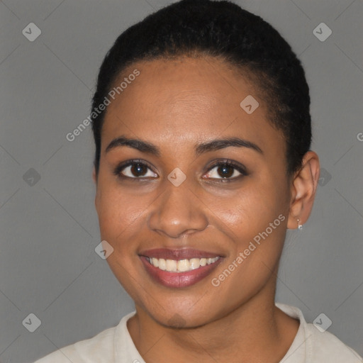 Joyful black young-adult female with short  brown hair and brown eyes