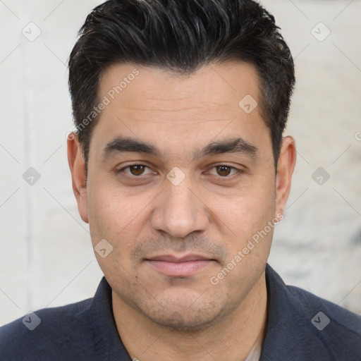 Joyful white young-adult male with short  black hair and brown eyes