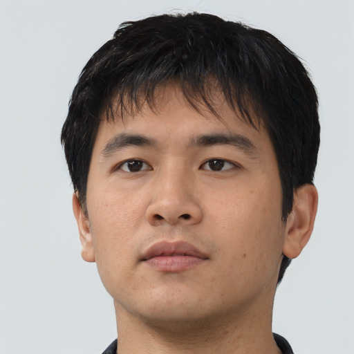 Neutral asian young-adult male with short  brown hair and brown eyes