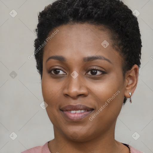 Joyful black young-adult female with short  brown hair and brown eyes