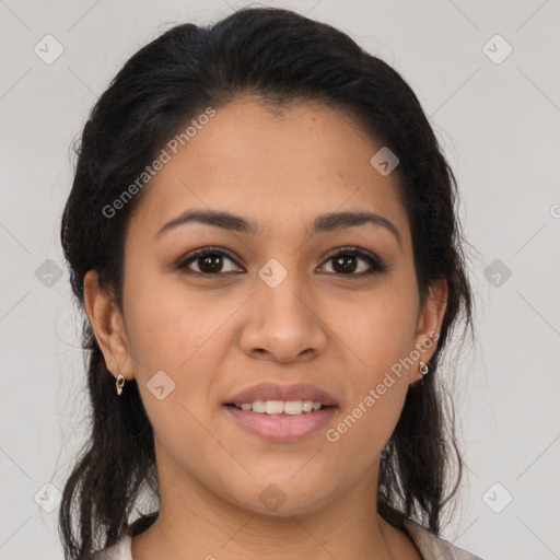 Joyful latino young-adult female with medium  brown hair and brown eyes