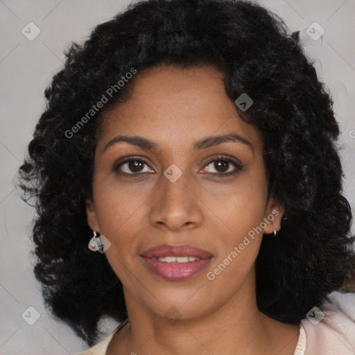 Joyful black young-adult female with long  brown hair and brown eyes