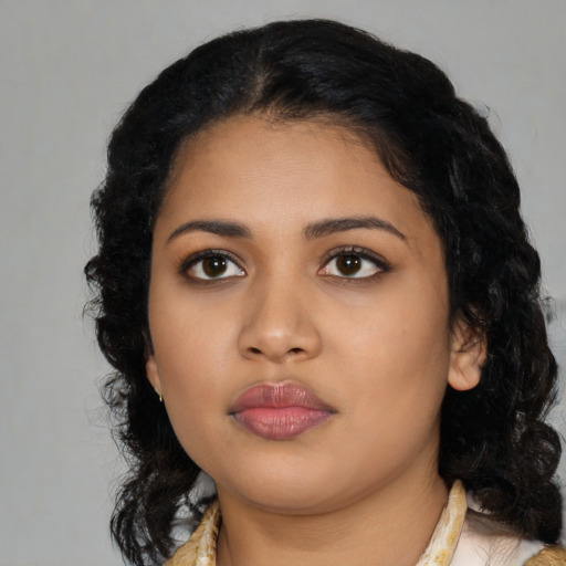 Neutral latino young-adult female with medium  black hair and brown eyes