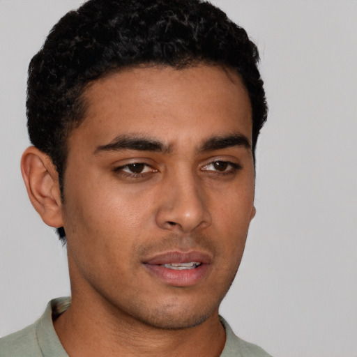 Neutral latino young-adult male with short  brown hair and brown eyes
