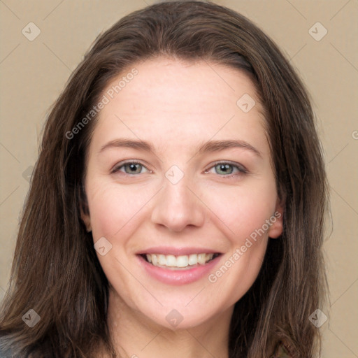 Joyful white young-adult female with long  brown hair and grey eyes