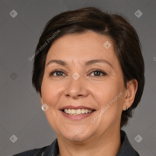 Joyful white adult female with medium  brown hair and brown eyes