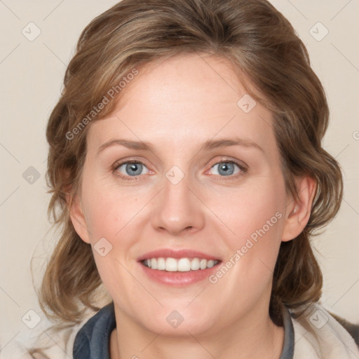 Joyful white young-adult female with medium  brown hair and blue eyes