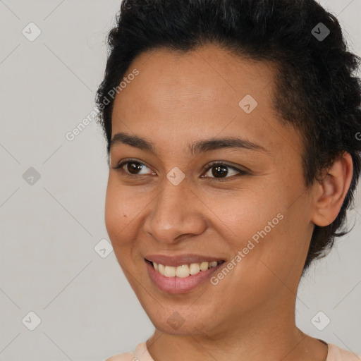 Joyful latino young-adult female with short  brown hair and brown eyes