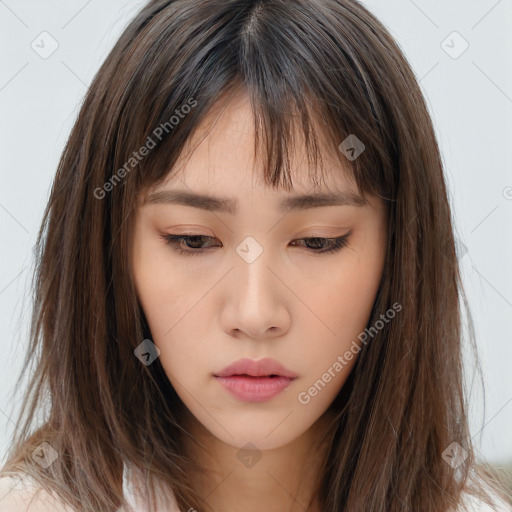 Neutral white young-adult female with long  brown hair and brown eyes