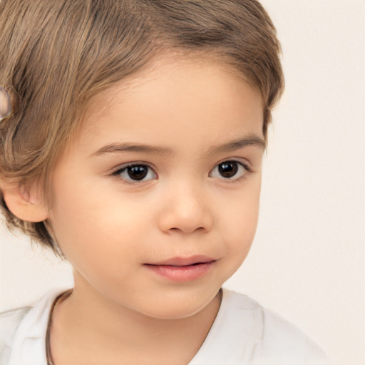 Joyful white child female with short  brown hair and brown eyes