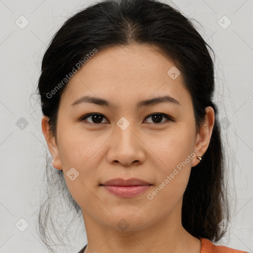 Joyful asian young-adult female with medium  brown hair and brown eyes