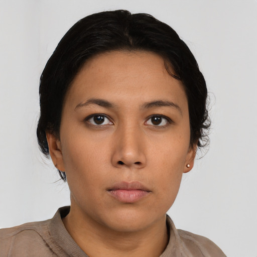 Neutral asian young-adult female with short  brown hair and brown eyes