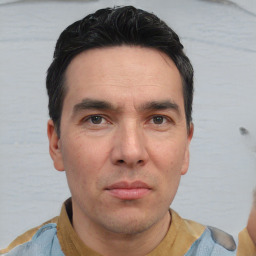 Neutral white adult male with short  black hair and brown eyes