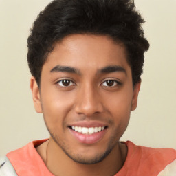 Joyful latino young-adult male with short  brown hair and brown eyes